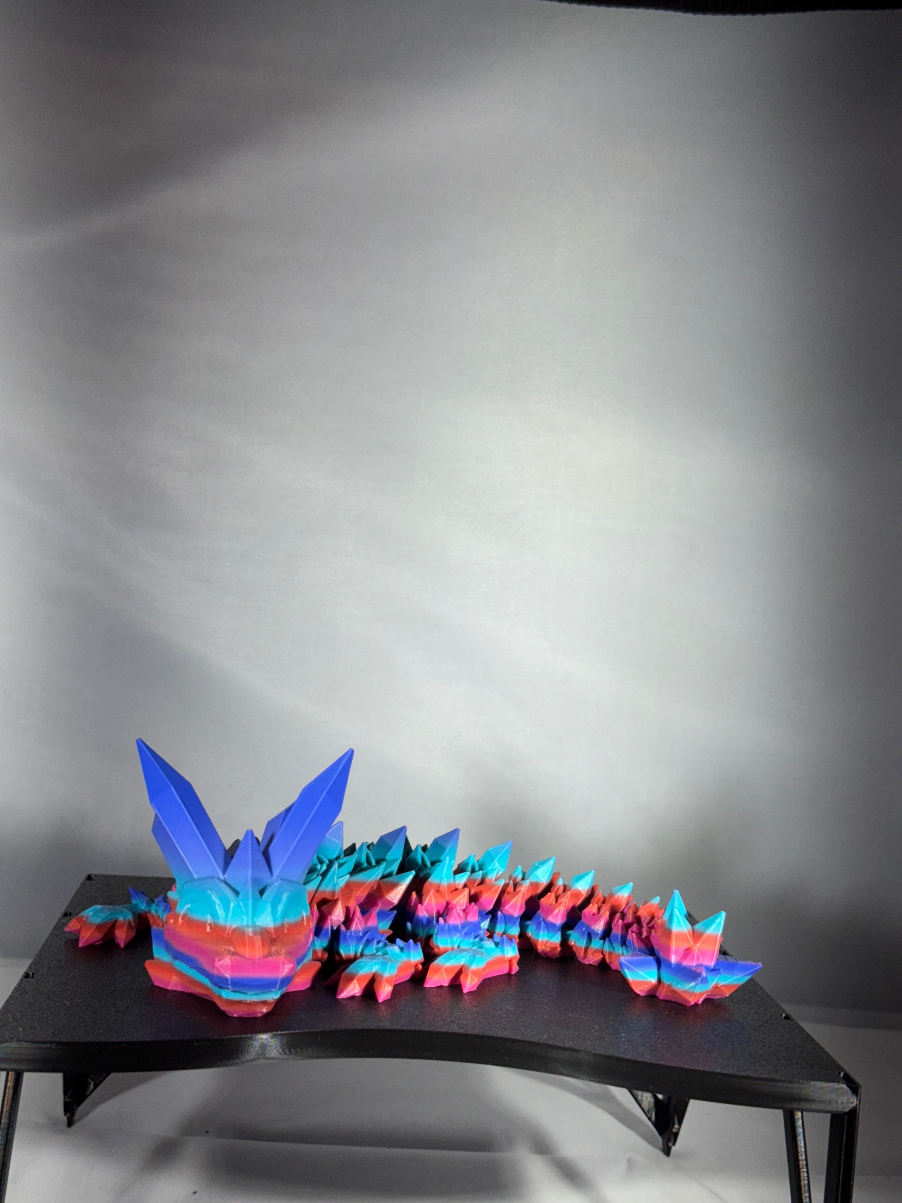 Lille krystal drage i regnbuefarver