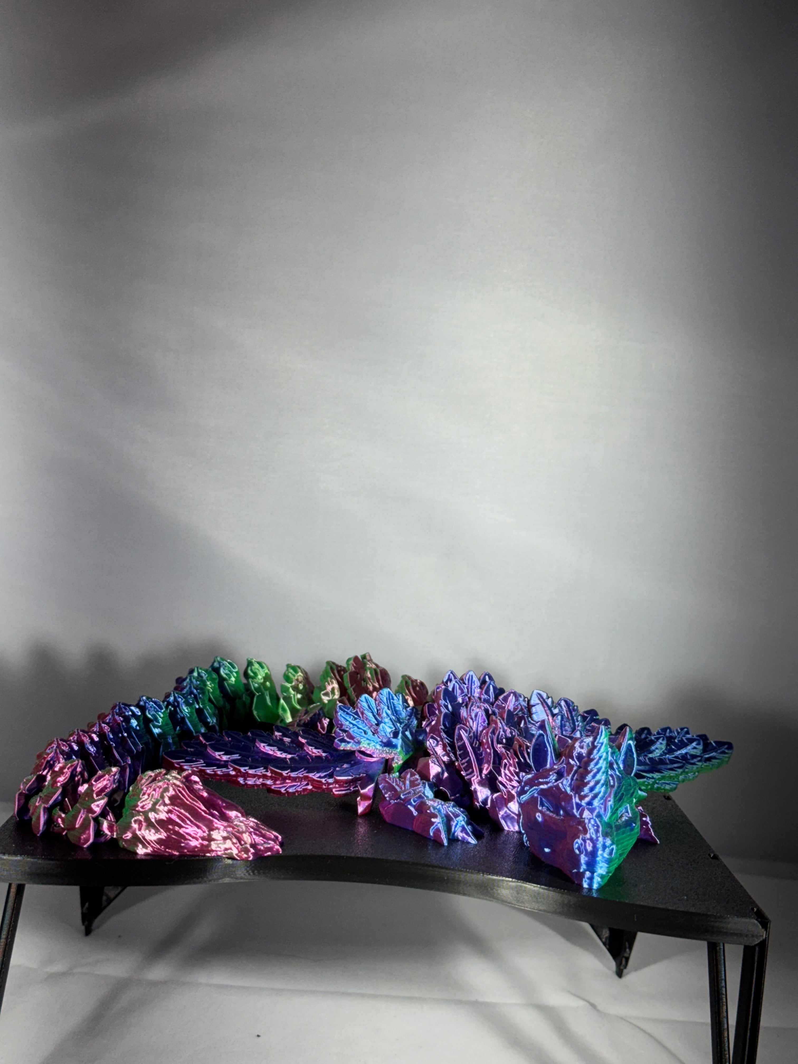 Enhjørninge drage i gul, lilla og blå