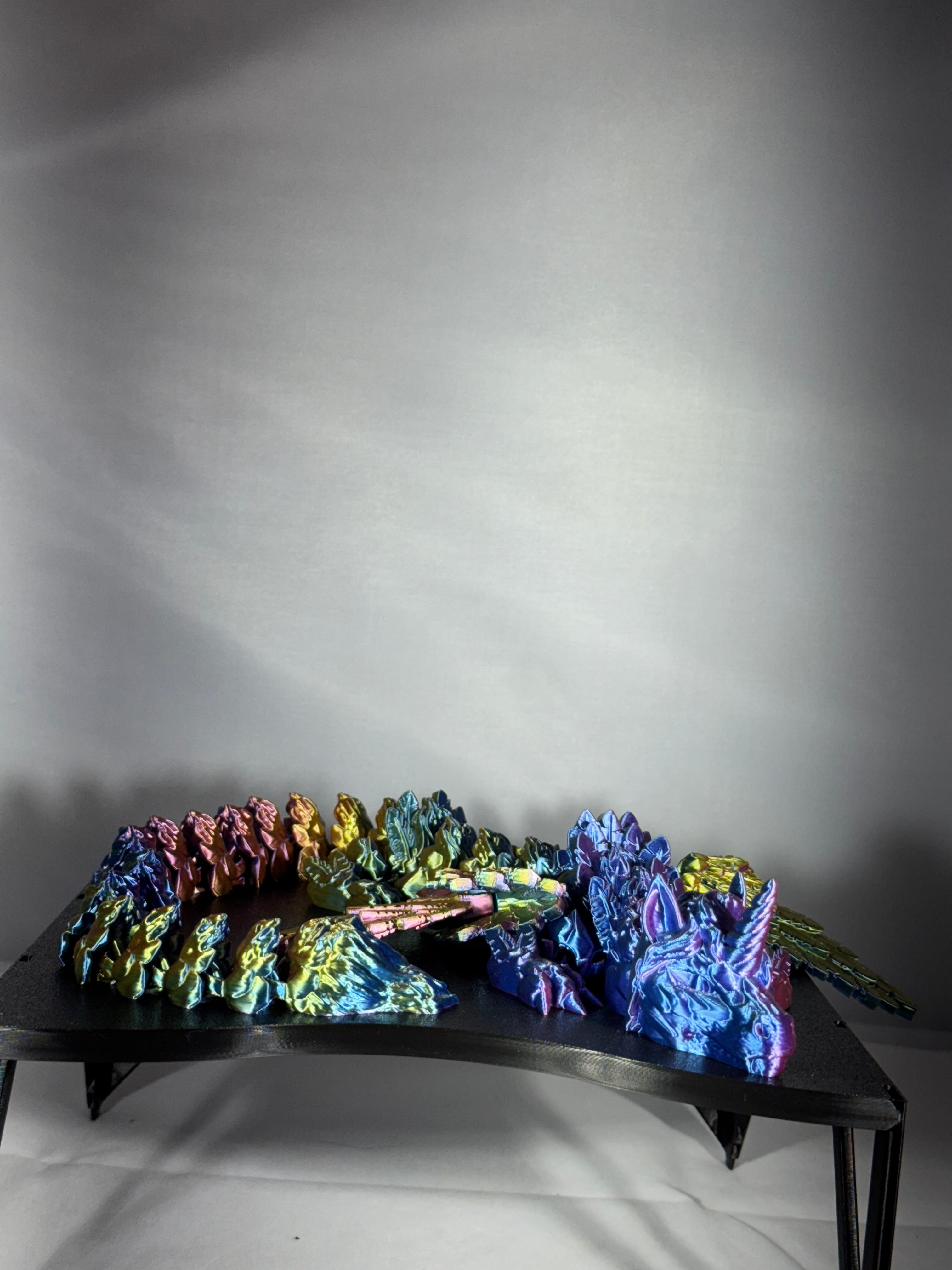 Enhjørninge drage i gul, lilla og blå