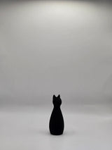 Kattefigur vist sammen med parfigurer