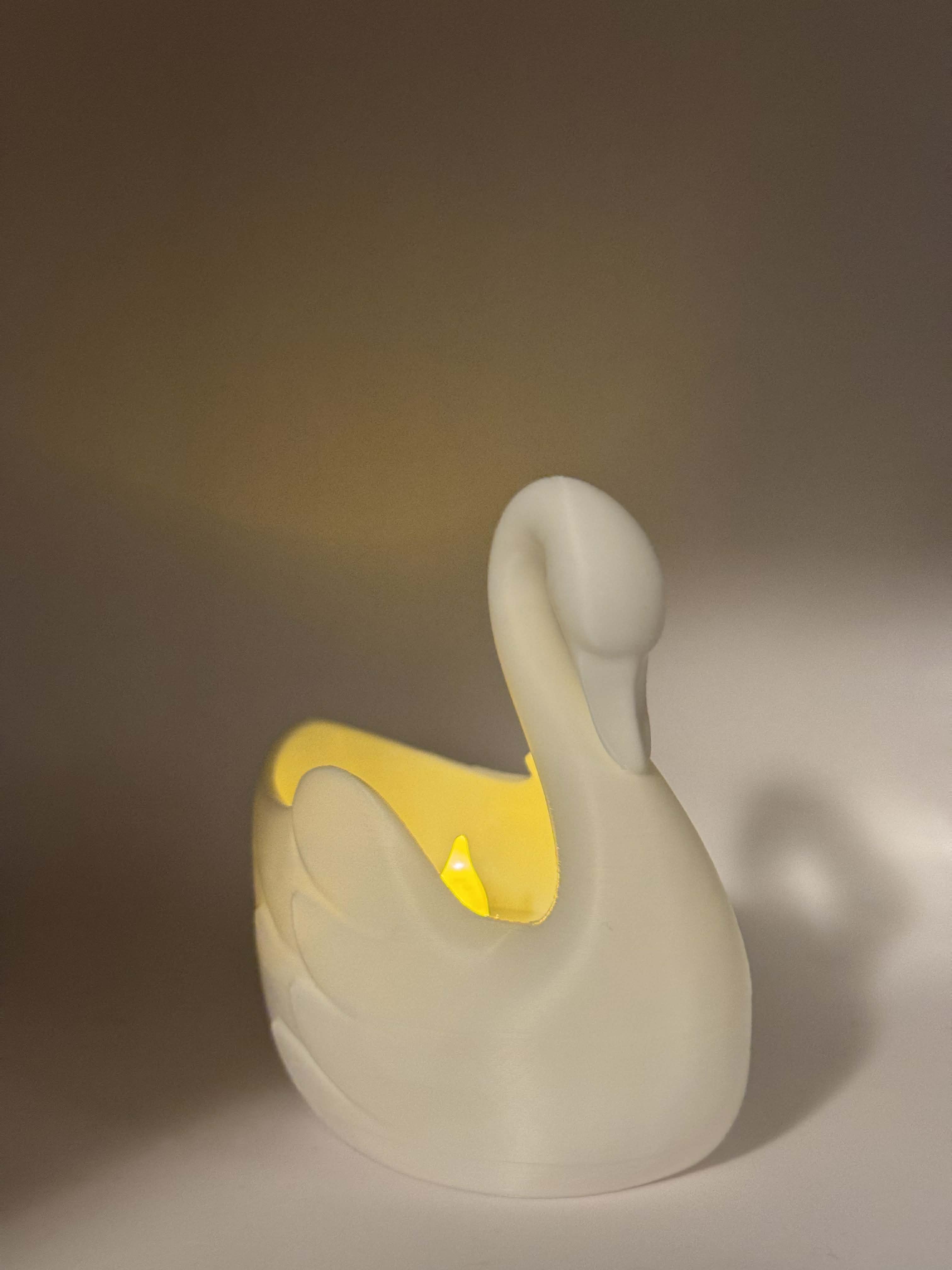 Lysestage formet som svane