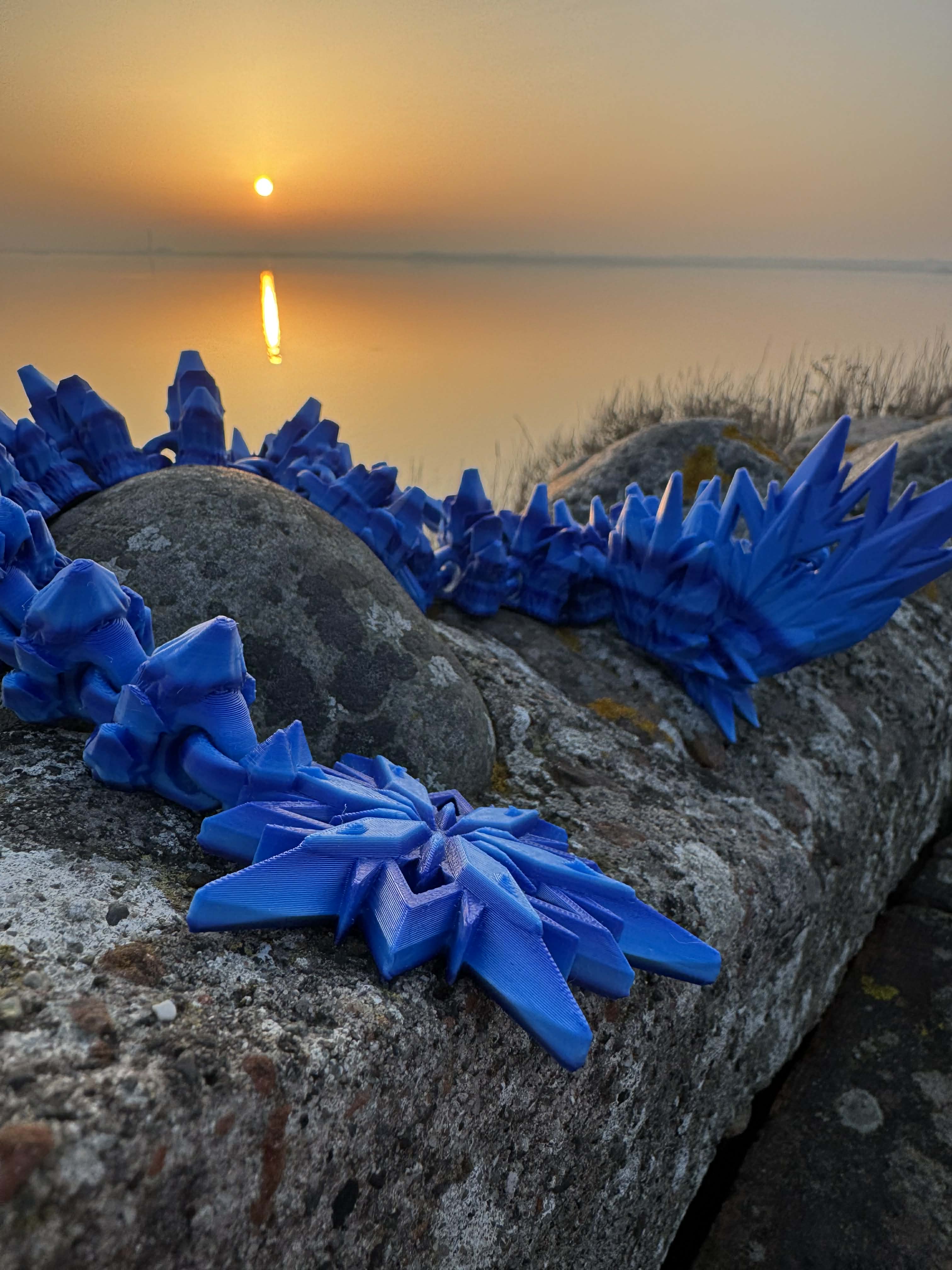 Isdrage i blå, lyseblå og marineblå