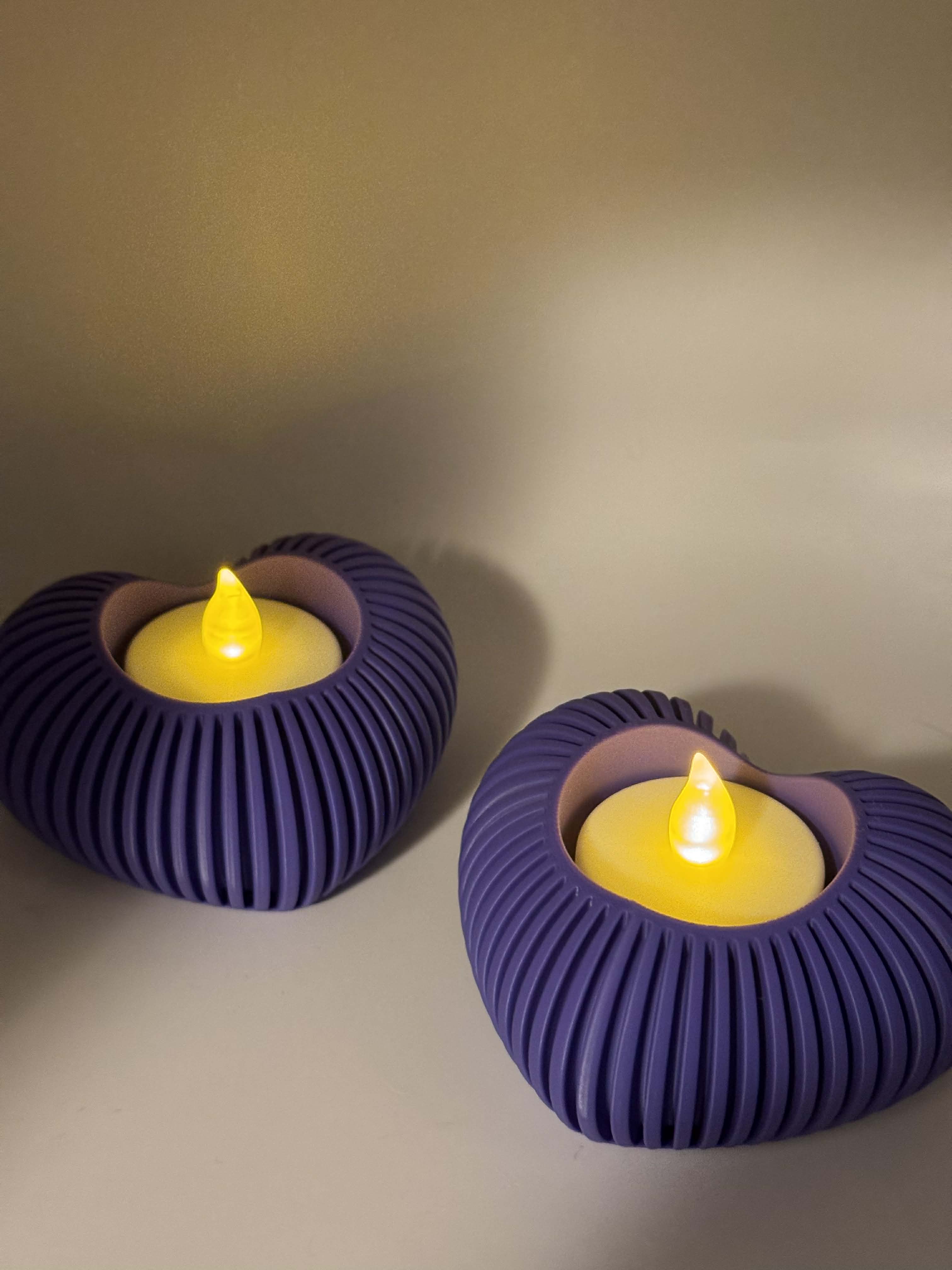 Lysestage formet som et hjerte