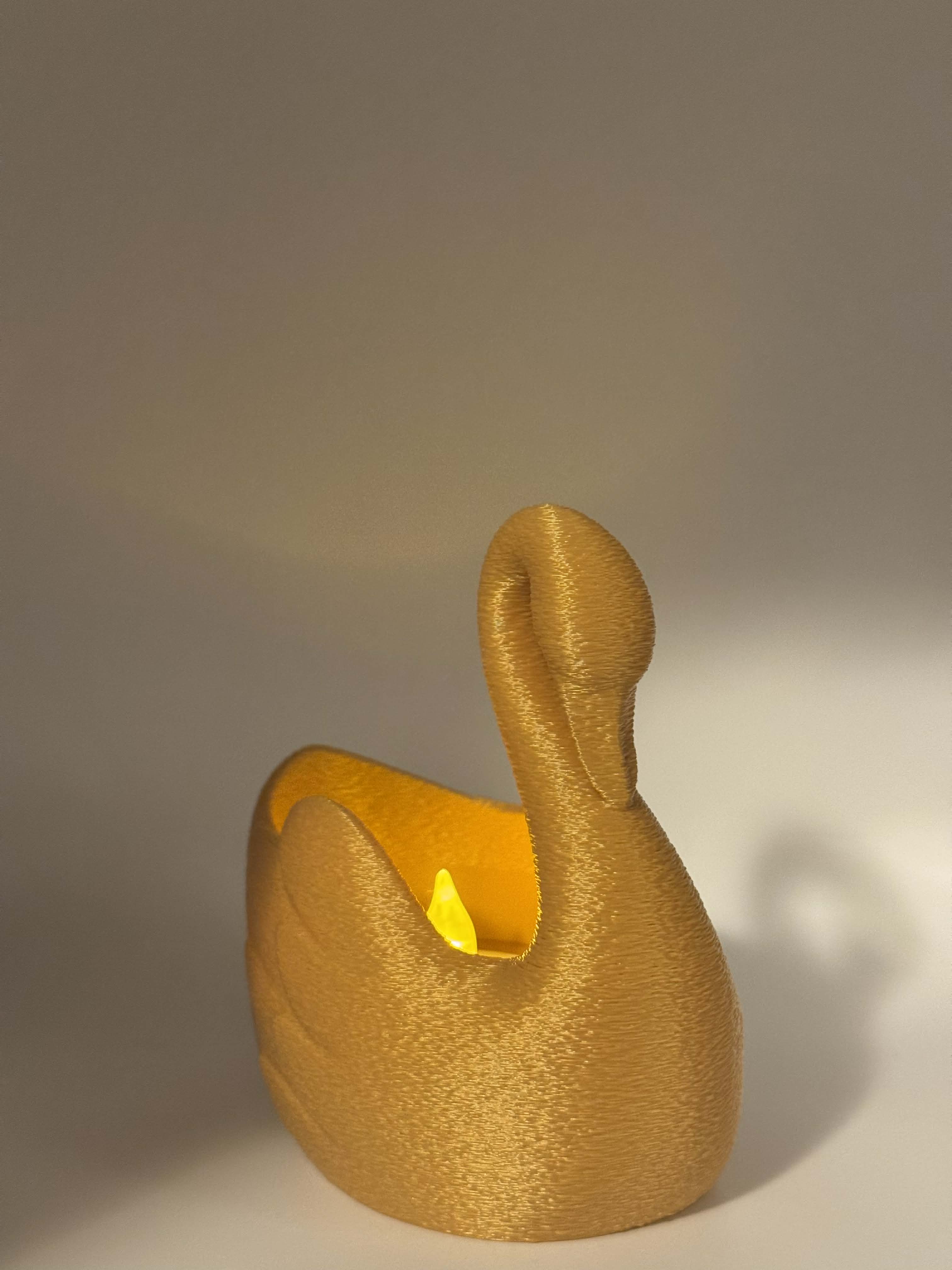 Lysestage formet som svane